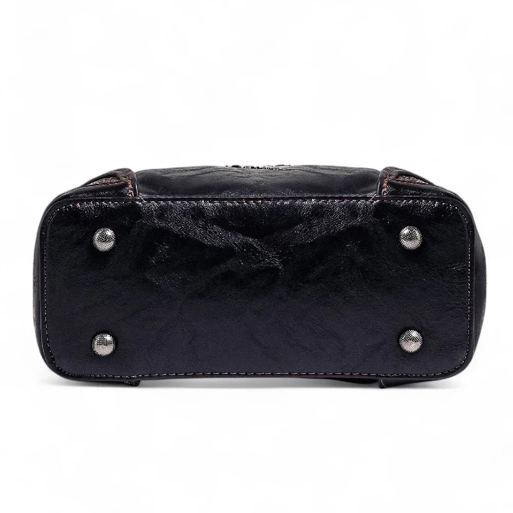 Exotic The Unique Embossed Round Floral Flap Sling Bag.