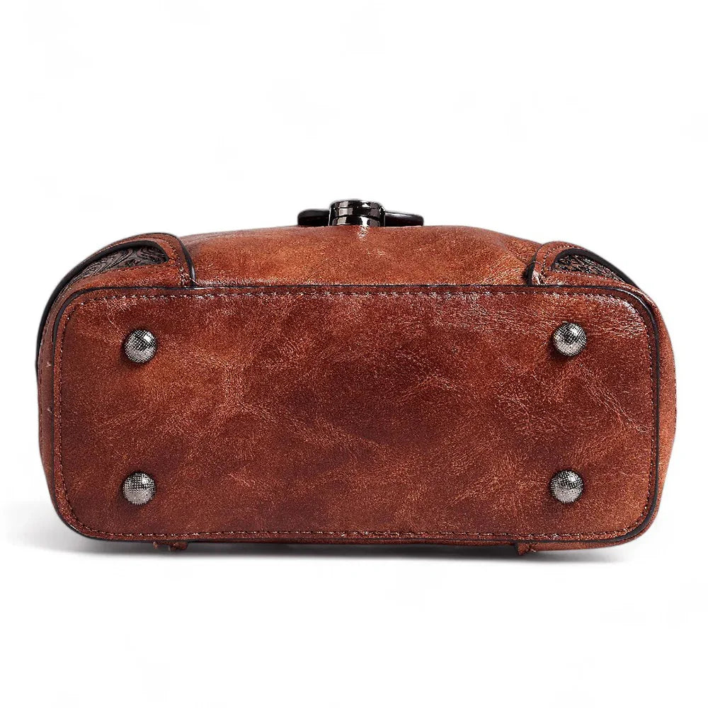 Exotic The Unique Embossed Round Floral Flap Sling Bag.