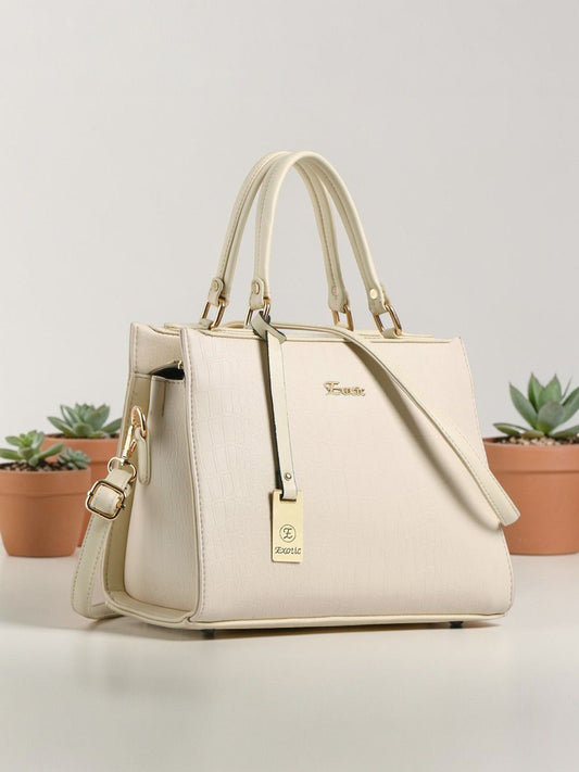 EXOTIC Studded hand bag for women