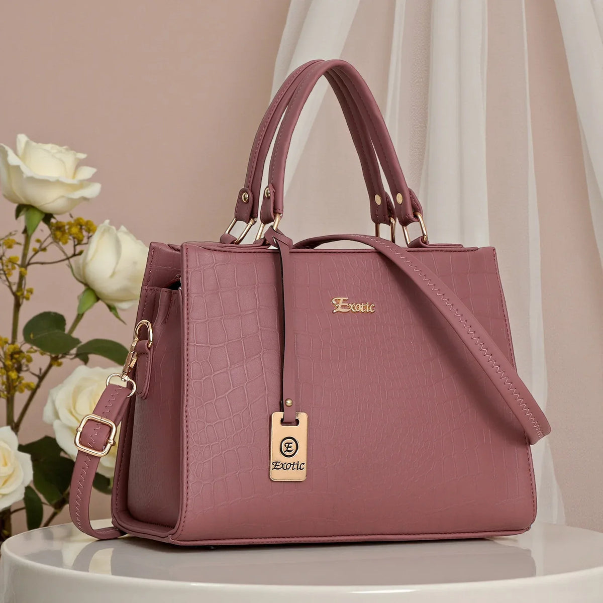 Exotic Studded hand bag.