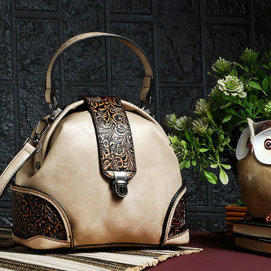 Exotic The Unique Embossed Round Floral Flap Sling Bag.